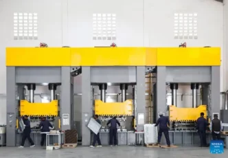 African factory workers on a production line