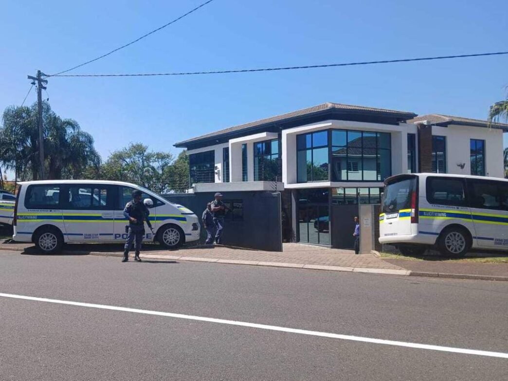 Police officers conducting a firearms compliance inspection