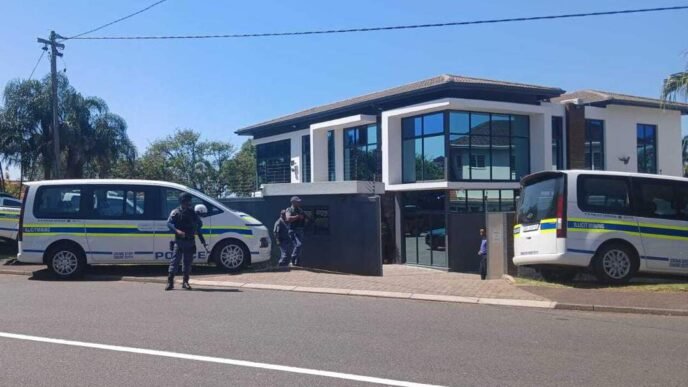 Police officers conducting a firearms compliance inspection