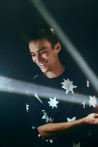 Jacob Collier performing on stage