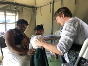 Children receiving health checks at the Child Health Clinic Open Day