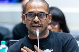 Fadiel Adams speaking at a press conference