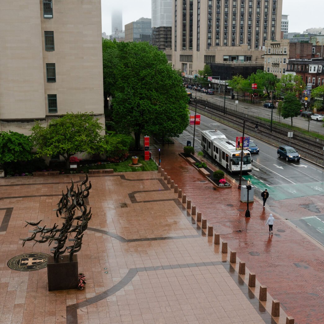 Pride flags on a university campus