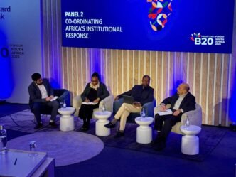 Joel Netshitenzhe speaking at a conference