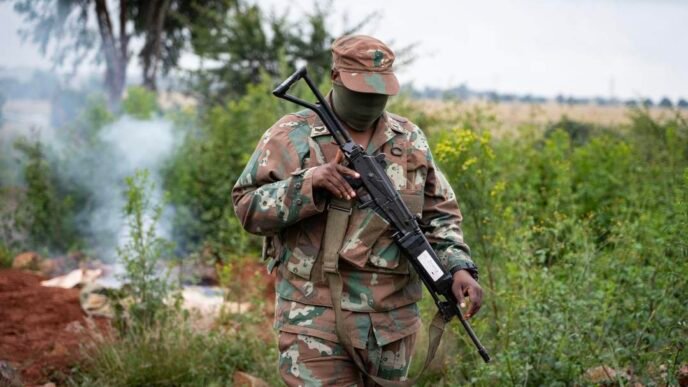 SANDF soldiers confiscating machinery from zama zamas in Randfontein