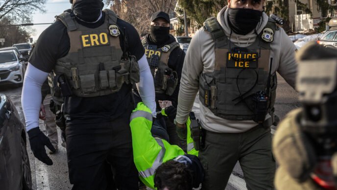 Immigration enforcement agents at work