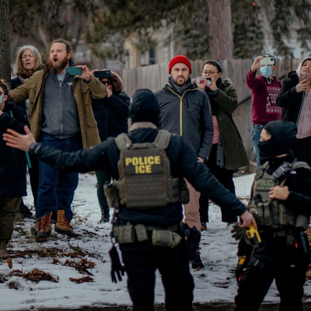 Julie Le speaking at a campaign event