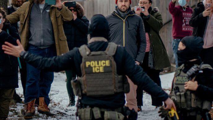 Julie Le speaking at a campaign event
