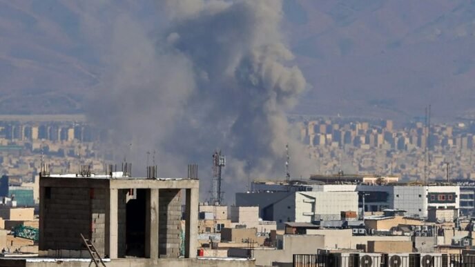 Smoke rising from the site of airstrikes in Tehran