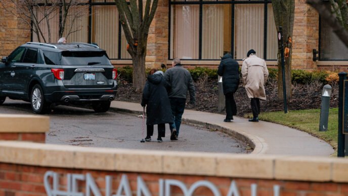 Jewish community members gathering at a synagogue