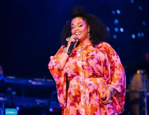 Jill Scott performing on stage