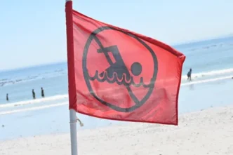Red danger flag at Melkbosstrand Beach