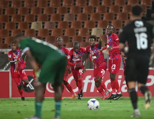 Milford FC players celebrating their win