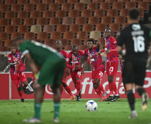 Milford FC players celebrating their win