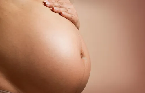 Mother holding newborn baby
