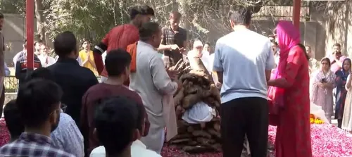 Harish Rana's family performing final rites