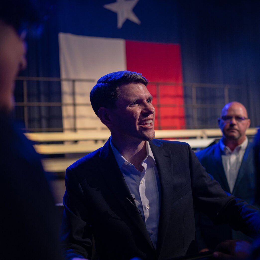Politician speaking at a podium