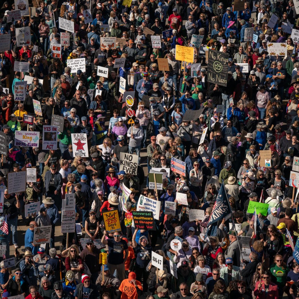 Protesters marching with signs