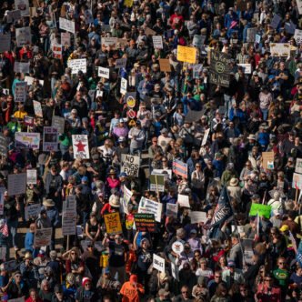 Protesters marching with signs
