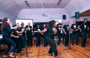 Rosa Choir members singing together