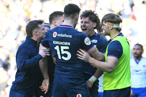 Scotland players celebrating their win over France