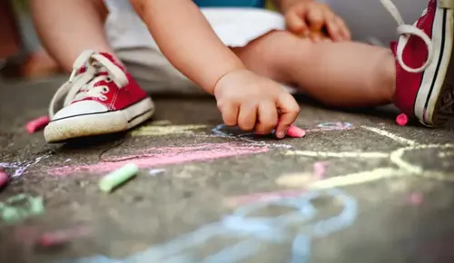 Teacher in classroom with pupils