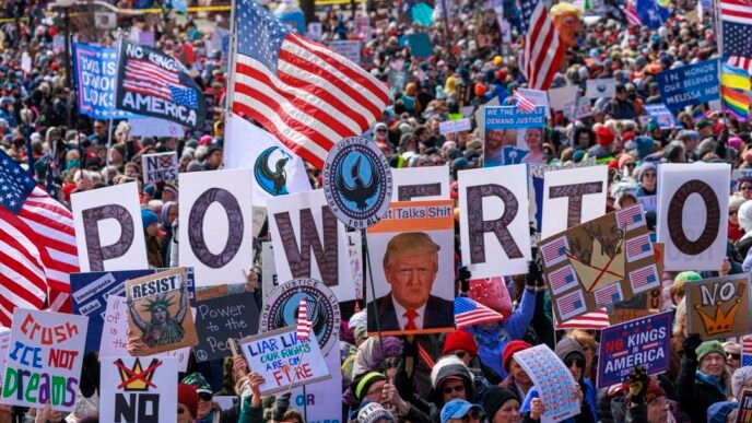 Protesters marching against Trump