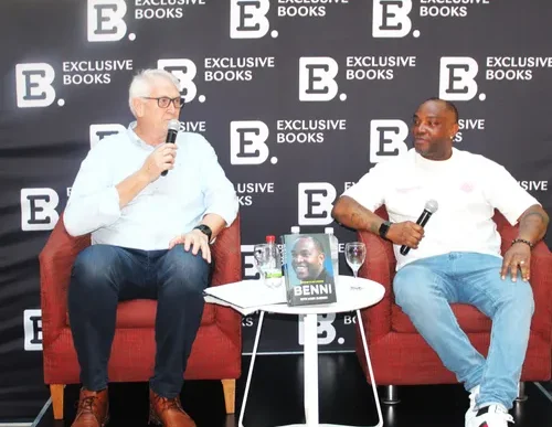 Benni McCarthy at a football match