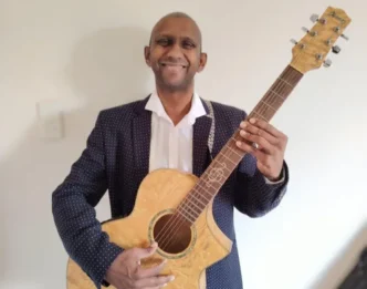 Clifford Andrew performing on stage