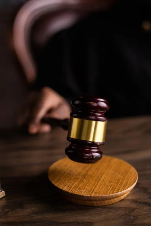 Image of a gavel and a scale of justice