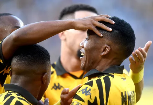 Kaizer Chiefs player Pule Mmodi celebrates after scoring against Orlando Pirates