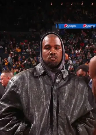Kanye West performing on stage
