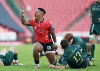 Lions players celebrating a try