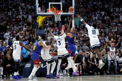 Timberwolves players celebrating their win
