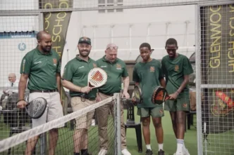 Padel tennis court with players in action