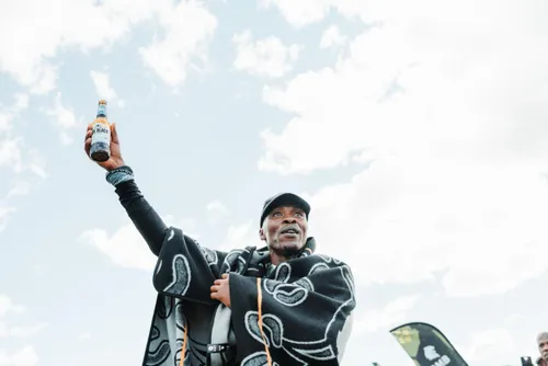 Thato Kabeli crossing the finish line