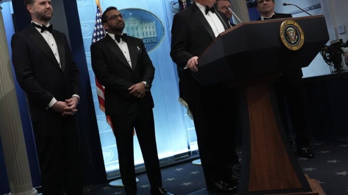 Donald Trump speaking at a podium