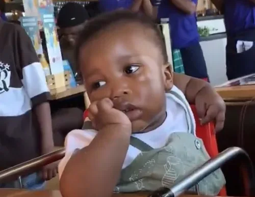 Baby's unimpressed reaction at Spur birthday party