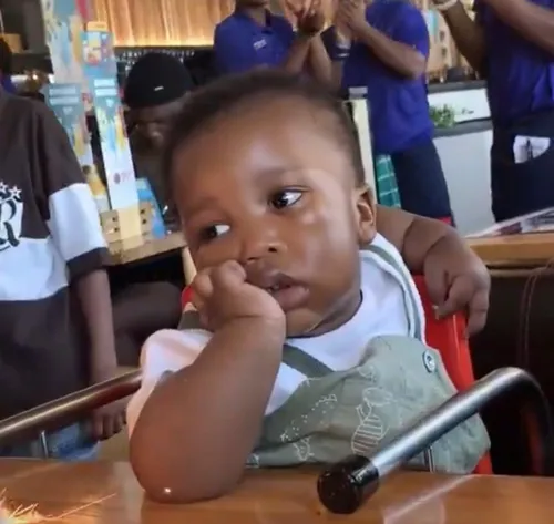 Baby's unimpressed reaction at Spur birthday party