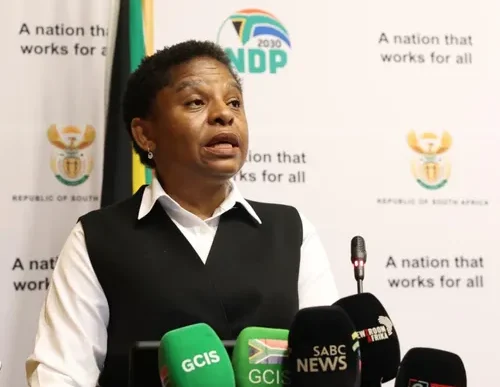 Minister Khumbudzo Ntshavheni speaking at a press conference