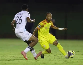 Tshegofatso Nama of Magesi FC challenged by Kobamelo Setlhodi of Orbit College