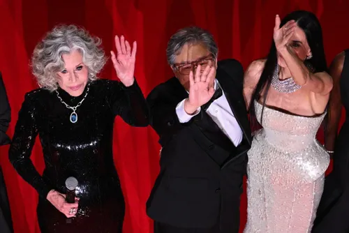 Jane Fonda and Gong Li on stage at the Cannes Film Festival