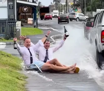 Van Hunks owner getting drenched by cars in a puddle