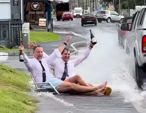 Van Hunks owner getting drenched by cars in a puddle
