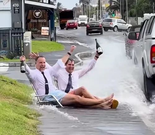 Van Hunks owner getting drenched by cars in a puddle