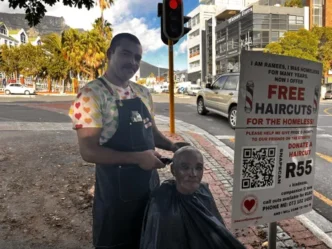 Rhameez Jansen cutting hair on the streets of Cape Town