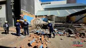 Emergency services personnel responding to wall collapse in Durban
