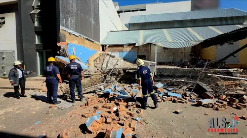 Emergency services personnel responding to wall collapse in Durban