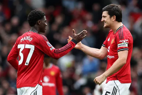 Manchester United players celebrating their win