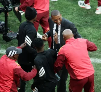 Orlando Pirates head coach Abdeslam Ouaddou celebrates with his staff